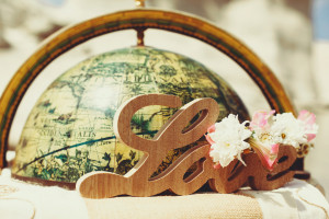 wooden love sign and vintage globe