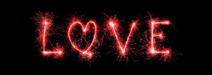 love written with sparklers