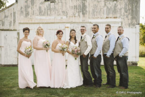 bridal party in rustic setting