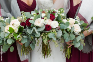 red and green wedding bouquets
