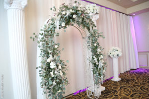 wedding arch with greenery