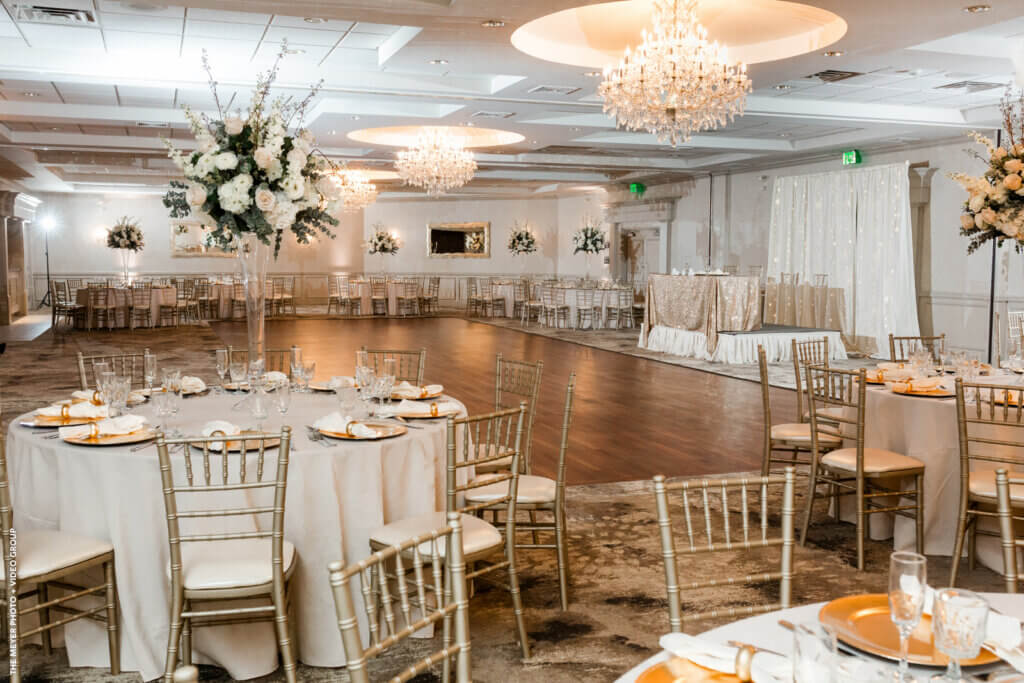 ballroom in mercer county nj set with tables and floral centerpieces